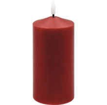 Rött LED-blockljus med flamformat ljus.