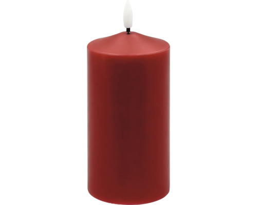 Rött LED-blockljus med flamformat ljus.