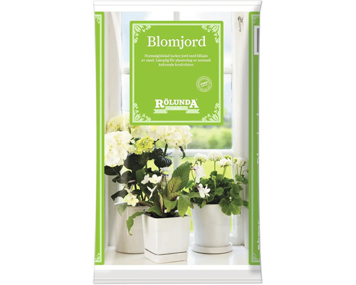 Rolunda Gard blomjord för krukväxter i en säck framför ett fönster med växter.