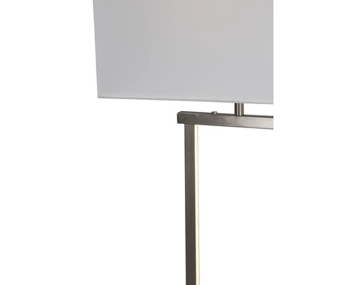 Närbild av en modern lampa med rektangulär textilskärm och metallram med integrerad LED ljuskälla.