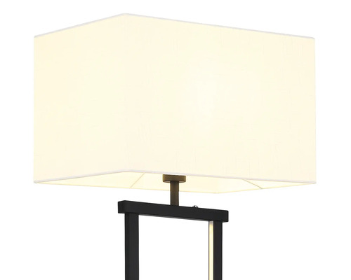 Lampa med krämvit rektangulär textilskärm och svart metallram.