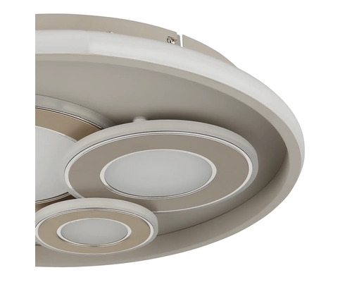 Modern LED-taklampa av metall och plast med flera runda, överlappande ljuselement.