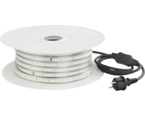 LED-ljusslang på vit spole med svart strömkabel och kontakt.