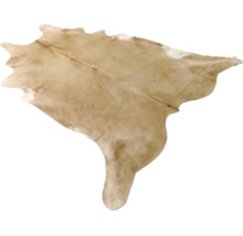 Kohudsmatta av äkta päls i beige med naturlig form.