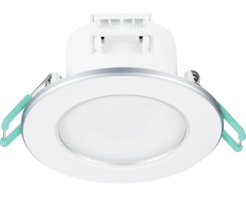 Rund infälld LED-spotlight med monteringsklämmor och matt kåpa för takmontering.