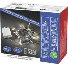 Konstsmide LED-ljusslinga för utomhusbruk, varmvit, 40 lampor, transparent kabel, batteridriven med timer.