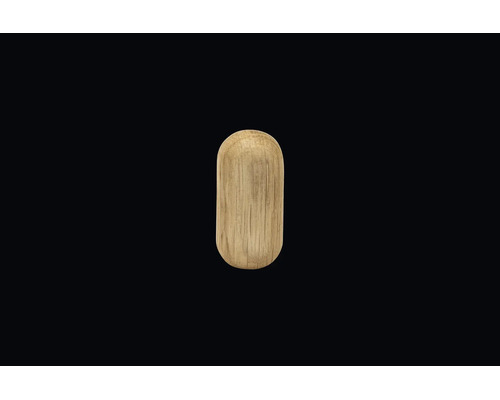 Oval möbelknopp av trä med ådring.