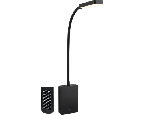 LED vägglampa med flexibel arm och självhäftande fäste för användning som läslampa.
