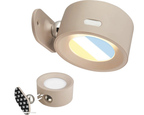 Rund LED vägglampa med magnethållare och självhäftande fäste för flexibel justering.