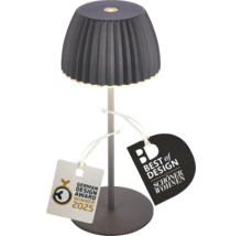 Modern bordslampa med veckad skärm och designutmärkelser