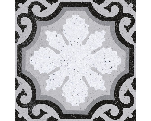 Dekorativ golvplatta med ornamentalt mönster