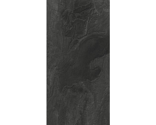 Närbild av en mörk skifferplatta med naturlig textur