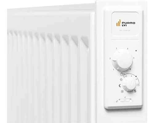 Närbild av ett element med vridknappar för temperaturkontroll