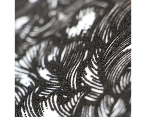 Detaljbild av en matta med grafiskt mönster