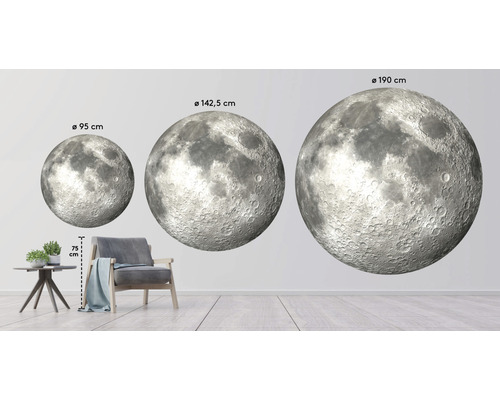 Dekorativa måne väggdekaler i olika storlekar i vardagsrummet