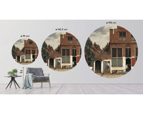 Tre runda väggdekorationer med en historisk stadsmotiv i olika storlekar, visade i ett vardagsrum.