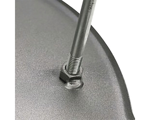 Detaljbild av en skruv med mutter