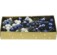 Dekorativa bärkvistar i en låda