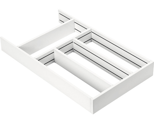 Vit lådinsats med fack för förvaring av föremål i en låda