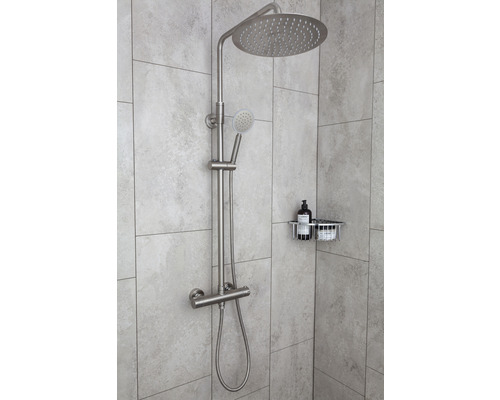 Duschsystem med takdusch och handdusch i badrum