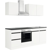 Köksbänk med överskåp, köksfläkt, spis och diskho