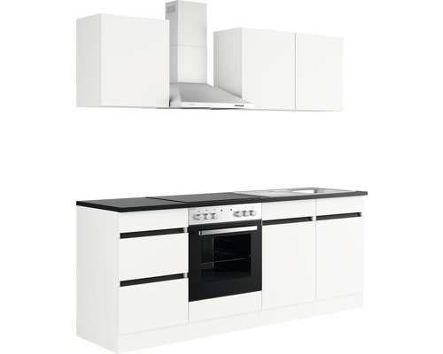 Köksbänk med överskåp, köksfläkt, spis och diskho