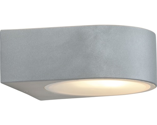 Vägglampa av metall med rund ljusyta