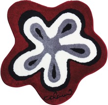 Blomformad matta med flerfärgad design