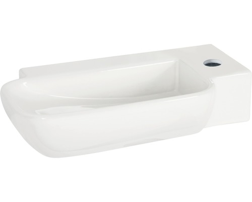 Vitt keramiskt handfat för väggmontering