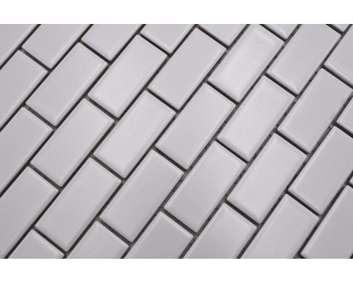 Rektangulära mosaikplattor i diagonal arrangemang