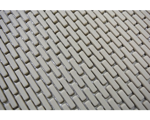 Närbild av en duschmatta med ett rektangulärt mönster