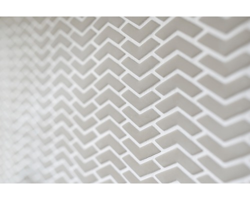 Detaljvy av kakel i pildesign för väggdekoration