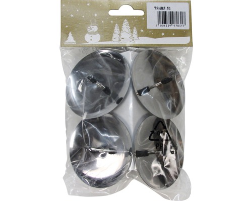 Förpackning med fyra ljushållare i metall