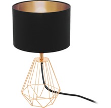 Bordslampa med svart lampskärm och geometrisk trådram