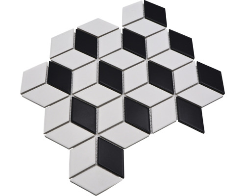 Mosaikplattor i svart och vitt med kubmönster