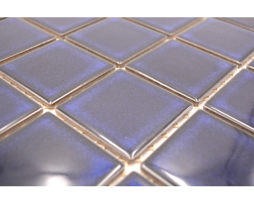 Detaljvy av kvadratiska mosaikplattor