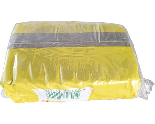Paket med gul lera för modellering, förpackad i folie