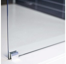 Detalj av duschvägg i glas med stöd