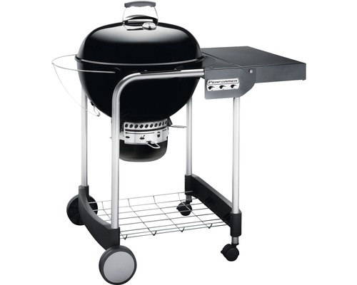 Svart klotgrill med sidobord och hjul