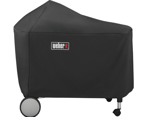 Svart Weber grillöverdrag på en grill