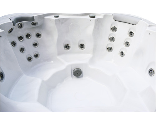 Interiörvy av en bubbelpool med strålar och avlopp