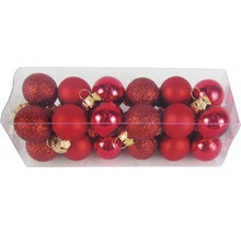 Förpackning med flera röda julgranskulor med glitter, matt och glansig finish