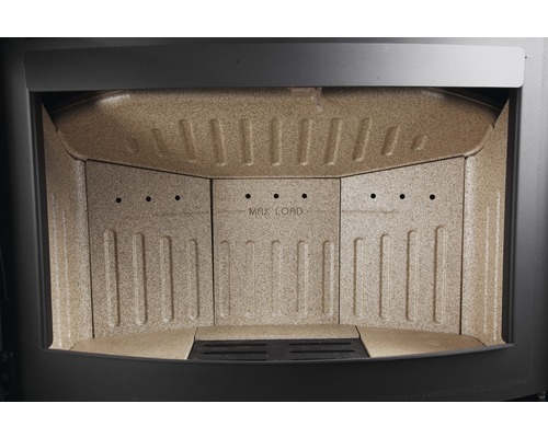 Invändig vy av en öppen spis med inskriptionen maximal belastning