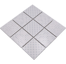 Mönster av nio kvadratiska plattor med olika geometriska mönster
