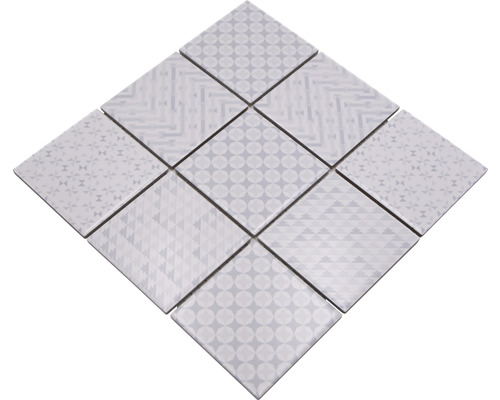 Mönster av nio kvadratiska plattor med olika geometriska mönster