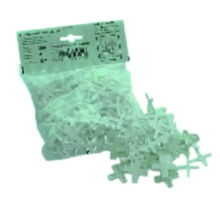 Förpackning med fogkryss för plattor