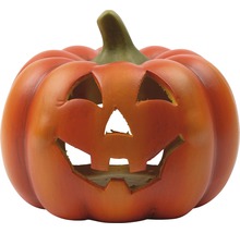 Halloweenpumpa med snidat ansikte för dekoration