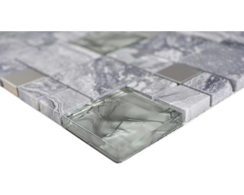 Mosaikplatta av glas och sten