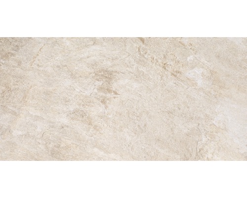 Närbild av en beige keramisk platta med marmorstruktur.