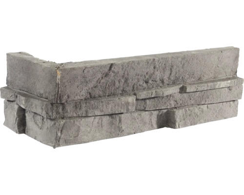 Grå hörnfasadstenar av sten